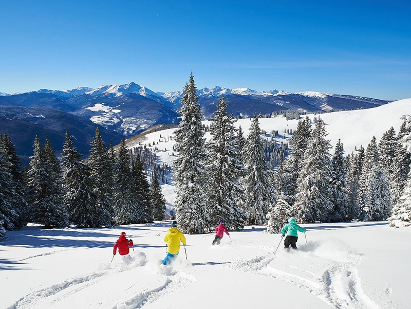 Vail skiers powder piste © Jack Affleck