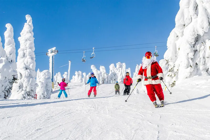 Santa Skiing Big White at Christmas © Big White Ski Resort