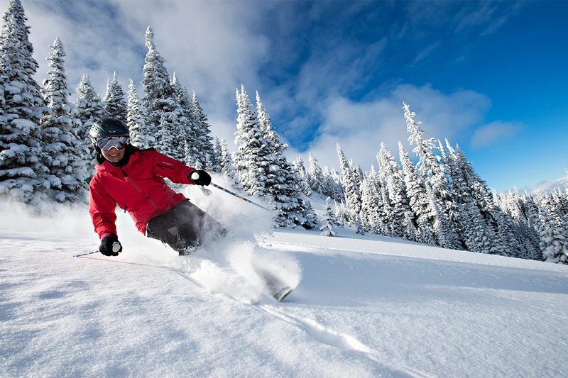 5d1dc2fe63305sun peaks happy skier credit adam stein sun peaks resort