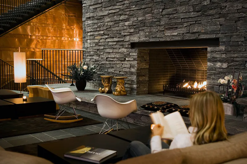5d1dc8ab67d14copperhill mountain lodge lobby fireplace credit copperhill jonas kullman