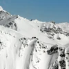5d25ef2fed176skiers on top rk heliski canada