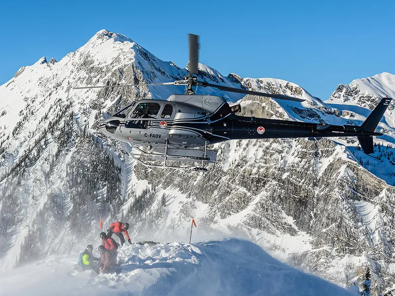 5d25f1d13ad52selkirk tangiers heli taking off alain sleigher