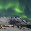 5d26078d32b52northern lights dusk over ersfjorden and tromso