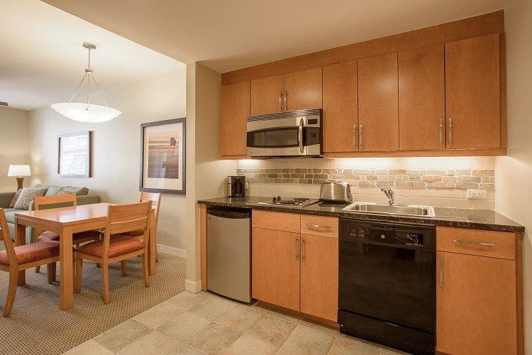 5e7ded984aff8fraser crossing one bedroom condo kitchenette gold kitchenette