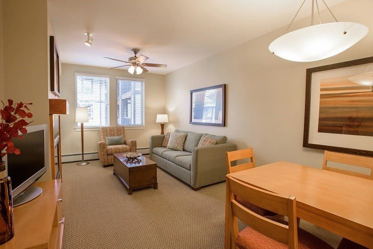 5e7ded98cc18afraser crossing one bedroom condo kitchenette gold living room