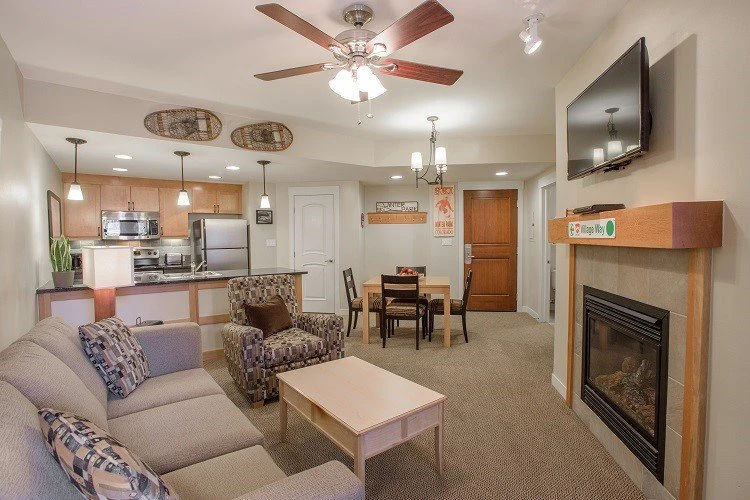 5e7ded9a4f7c5fraser crossing one bedroom condo kitchen gold fireplace