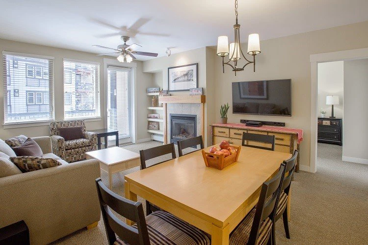 5e7deda2222c2fraser crossing two bedroom condo gold living room