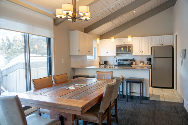 62860f5a7f267 Tunnel Mountain Resort Two Bedroom Suite Kids Loft Dining and Kitchen