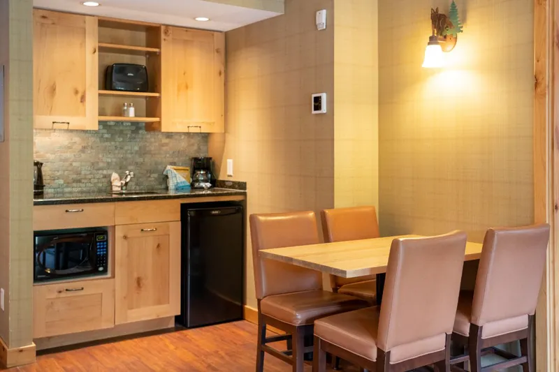 628633dd6e99e The Fox Hotel and Suites Superior One Bedroom Suite with Balcony Kitchen and Dining Area