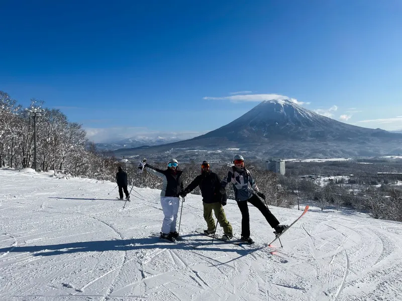 63e28623d664e Toni Andy and Scarlett in Niseko Mt Yotei Backdrop