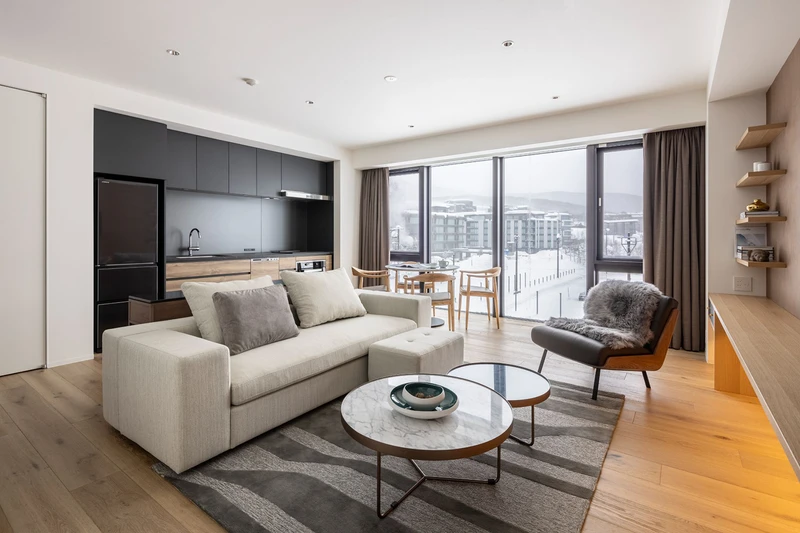 65521fa563804 Intuition Niseko 2 Bedroom Superior Apartment Living Area
