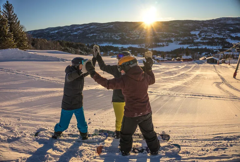 655dcfcb0131d Geilo Snowboaders High Fiving on Perfect Groomers