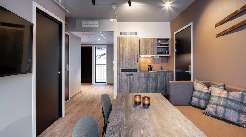 65b127c7857e5 Basecamp Narvik 2 Bedroom Apartment Kitchenette Living Area