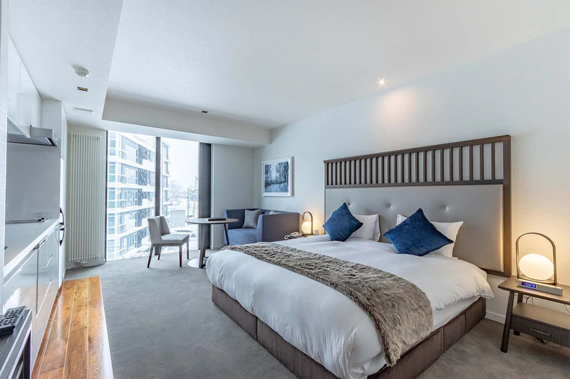 660fd75c556f8 The Vale Niseko Studio Bedroom Niseko Alpine Developments
