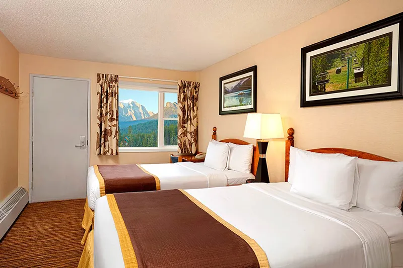6659b2962a464 Lake Louise Inn Standard Room with Two Double Beds