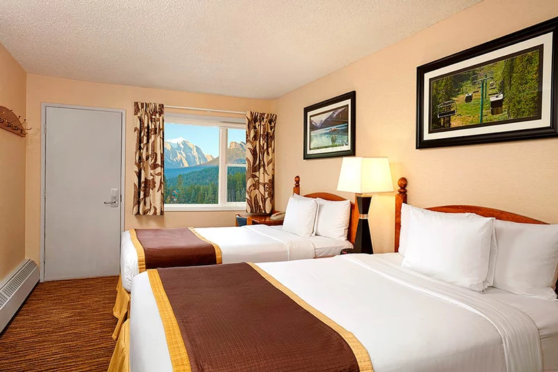 6659b2962a464 Lake Louise Inn Standard Room with Two Double Beds