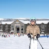 Ski Lodge Soltorget - Child smiles outside building © Stoen.se