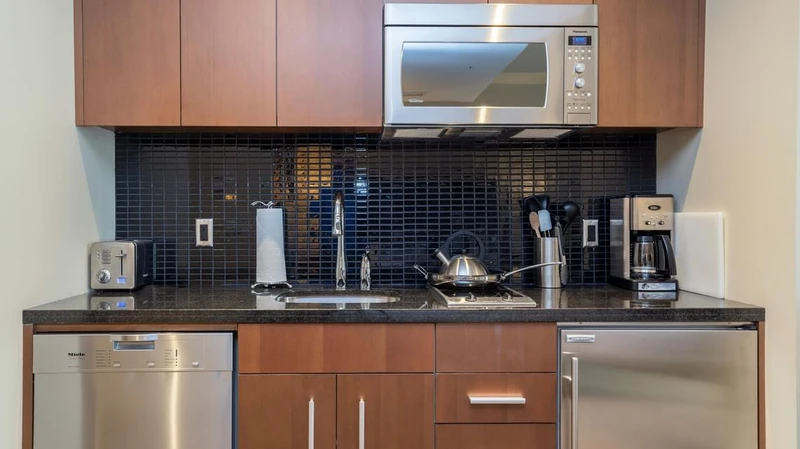 66c7520b2b030 Sutton Place Hotel Studio Suite Kitchen