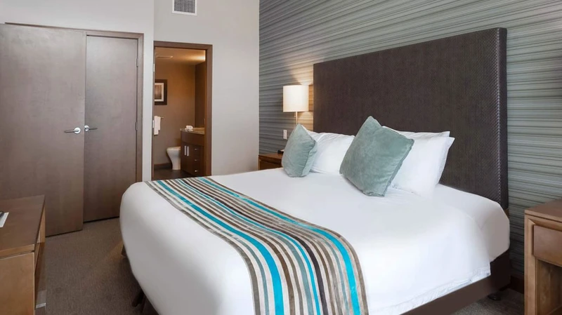 66c7544f0fdbe Sutton Place Hotel Two Bedroom Suite Bedroom 2