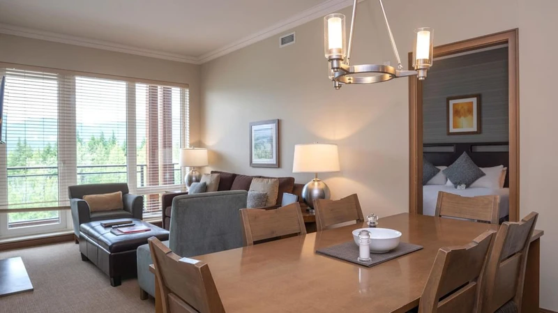 66c754521af25 Sutton Place Hotel Two Bedroom Suite Table and Living Space