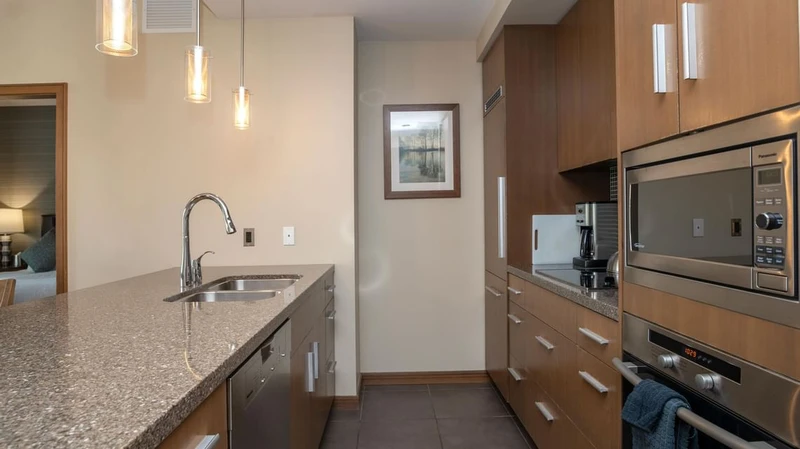 66c75453a8a6a Sutton Place Hotel Two Bedroom Suite Kitchen