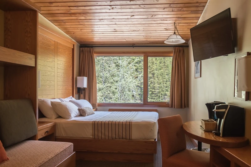 66c84a3f560b5 Sunshine Mountain Lodge Deluxe Waterfall View Room Bedroom