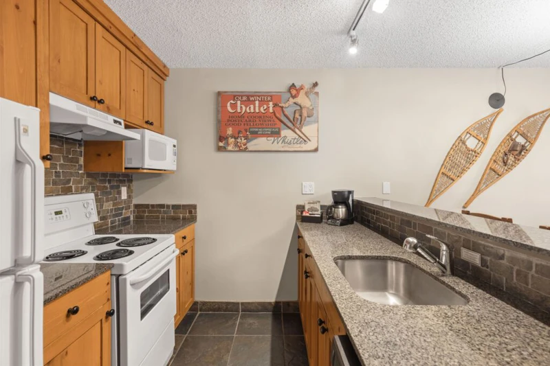 66c84f19068bc Tantalus Lodge Two Bedroom Suite Kitchen