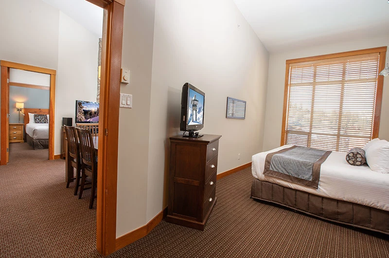 66c853ff36b7e Legends 3 Bedroom Suite Bedrooms and Living Area