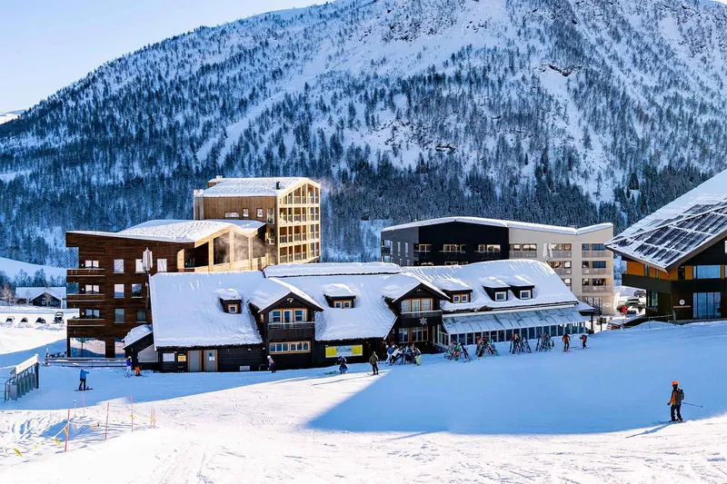 Myrkdalen Hotel and Apartments, exterior buildings in winter, Norway - Sverre Hjornevik