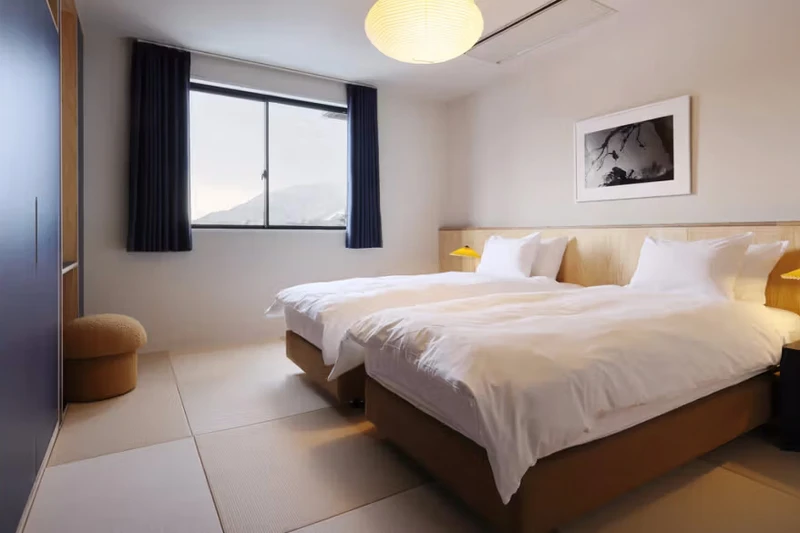 67b497ae56983 EVO Hotel Hakuba Superior Room Day Bed Hakuba Hospitality Group