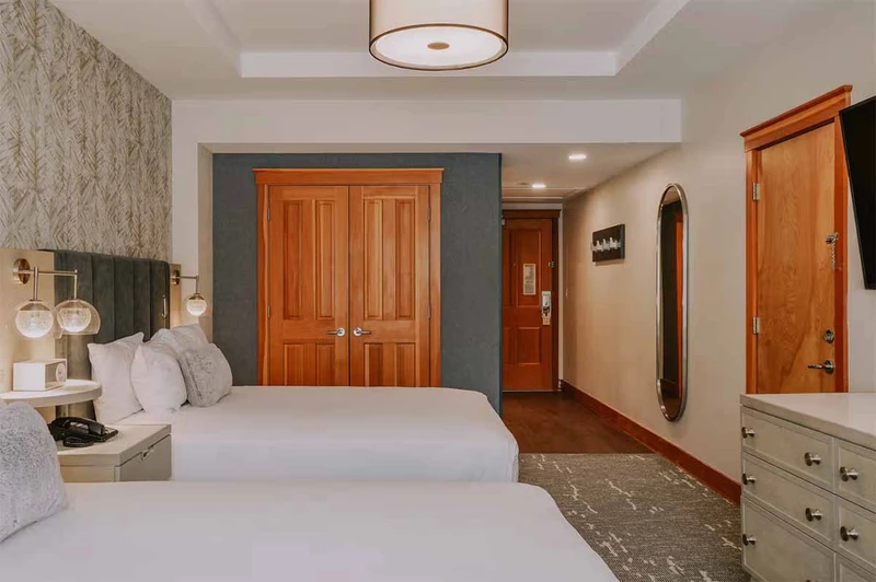 67b4cc94295e3 Summit at Big Sky Two Queen Bed Entrance Boyne Resorts