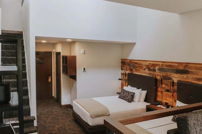 67b5ded537529 Huntley Lodge Loft Room Entrance Boyne Resorts