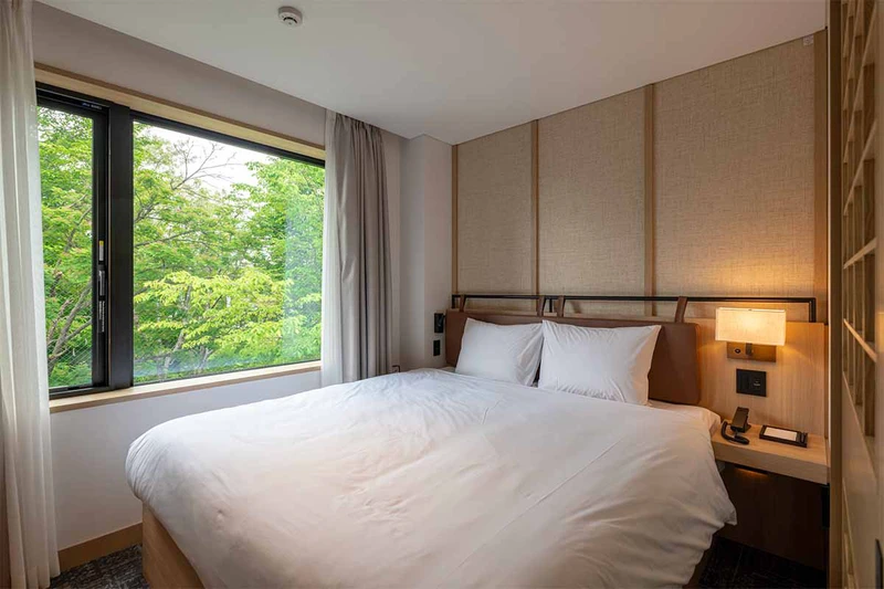 67bc94adb0509 Nozo Hotel Jr Suite Bedroom
