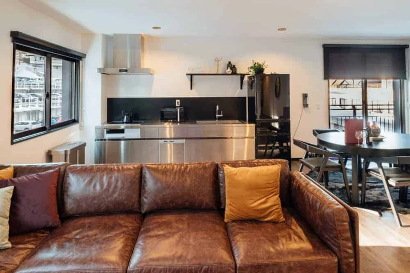 67c068f359e7b Happo Apartments 3 Bedroom Apartment Sofa and Kitchen Front On