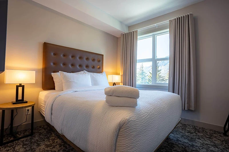 67f5397675c53 Basecamp Banff Suites One Bedroom Apartment Bedroom
