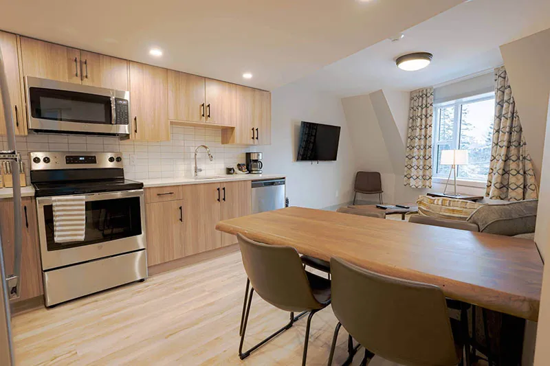 67f5429956164 Basecamp Banff Suites Superior Two Bedroom Apartment Kitchen Dining Area