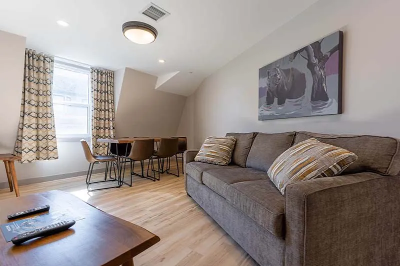 67f5482932c77 Basecamp Banff Suites Three Bedroom Apartment Livingroom