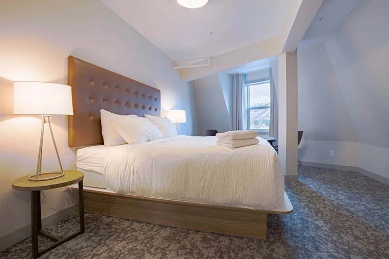 67f54b9bbfafd Basecamp Banff Suites Superior Three Bedroom Apartment Bedroom 1