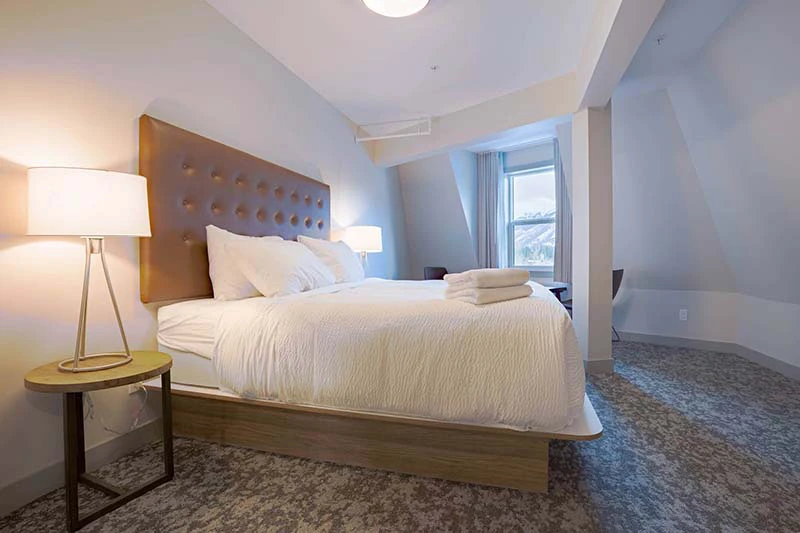 67f54b9bbfafd Basecamp Banff Suites Superior Three Bedroom Apartment Bedroom 1