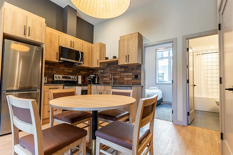 67fa4bc720ddb Basecamp Suites Revelstoke One Bedroom Suite Kitchen Dining