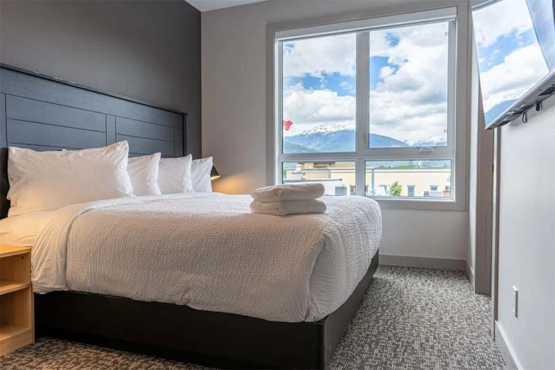 67fa503bb3f44 Basecamp Suites Revelstoke Two Bedroom Suite Bedroom 1