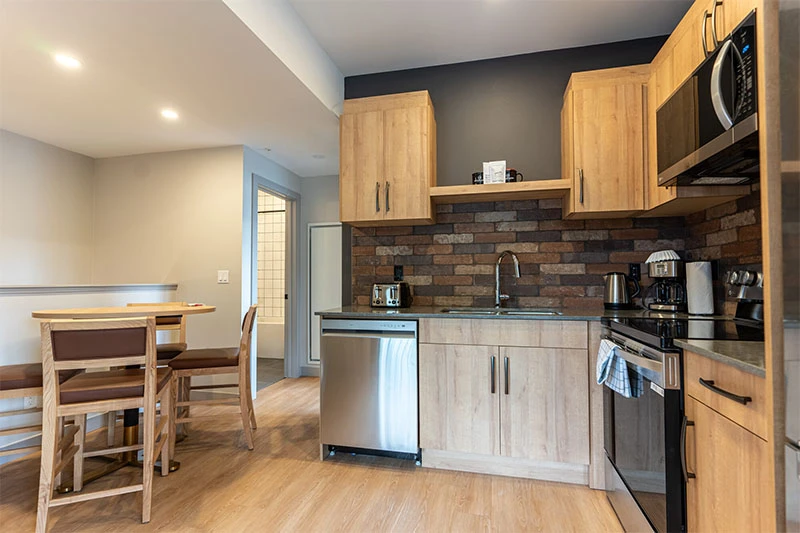 67fa503cdbac3 Basecamp Suites Revelstoke Two Bedroom Suite Kitchen Dining