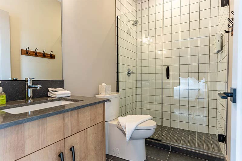 67fa503d37ede Basecamp Suites Revelstoke Two Bedroom Suite Shower