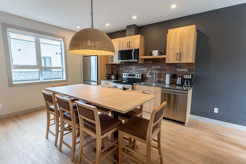 67fa584b1f40d Basecamp Suites Revelstoke Three Bedroom Suite Kitchen Dining