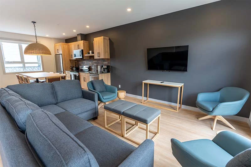67fa584b79a6a Basecamp Suites Revelstoke Three Bedroom Suite Living and Kitchen