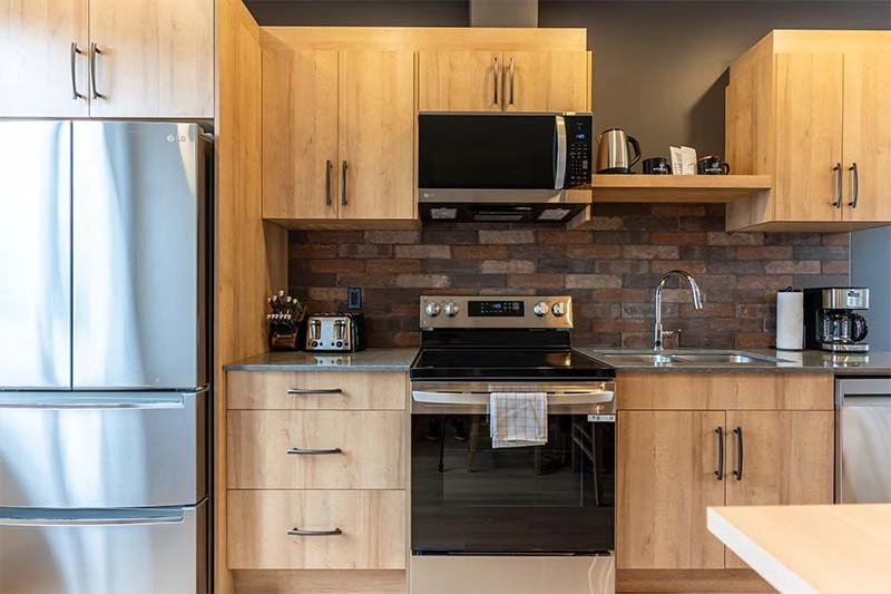 67fa5d69586c2 Basecamp Suites Revelstoke Four to Six Bedroom Suites Kitchen