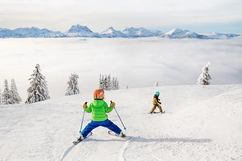689b6d2435169 Kids skiing in Revelstoke Ian Houghton Revelstoke Mountain Resort