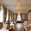 Fleischer's Hotel Restaurant with crystal chandeliers, panelled walls and drapes