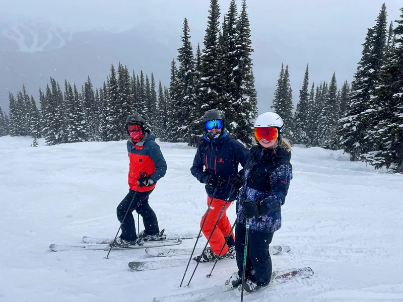 Managing Director Matt skiing powder off Harmony Ridge with his family in April 2023