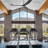 Treadmills and gym equipment with a mountain view